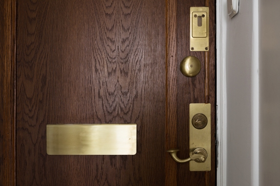 sveavägen fantastic frank therese winberg brass wooden door hallway